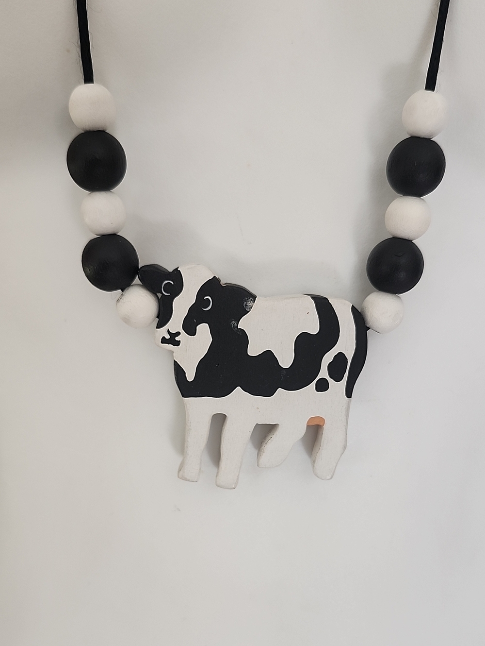 Signed P. Norton Black & White Cow Pendant Necklace